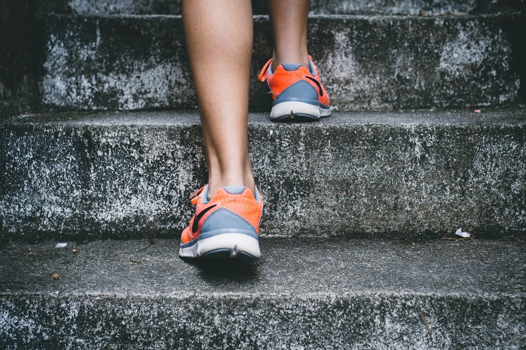Close up of shoes running gup steps. Exercise Regularly develops a good habit